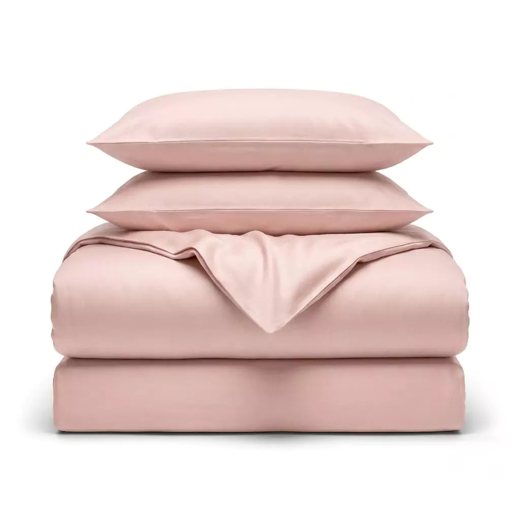 Folded 4-piece TENCEL™ Lyocell bedding set including duvet cover, fitted sheet and pillowcases Blush Petal