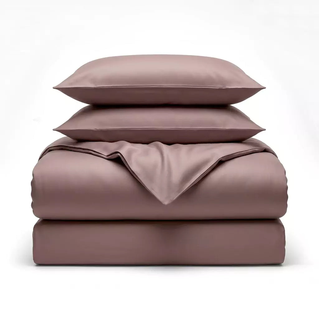 Folded 4-piece TENCEL™ Lyocell bedding set including duvet cover, fitted sheet and pillowcases Dusty Mauve