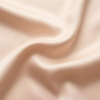 Macro close-up of silky smooth 100% TENCEL™ Lyocell fabric texture Ivory Mist