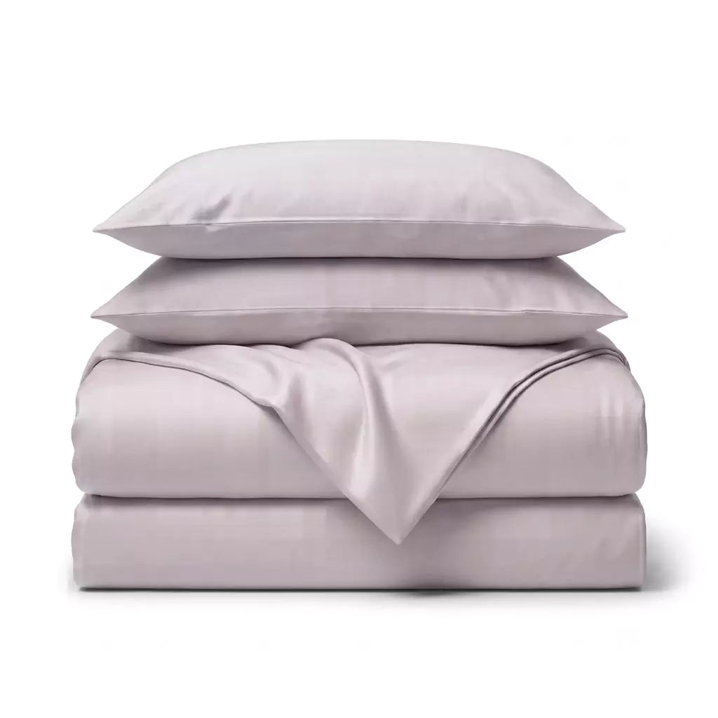 Folded 4-piece TENCEL™ Lyocell bedding set including duvet cover, fitted sheet and pillowcases Lavender_Fog