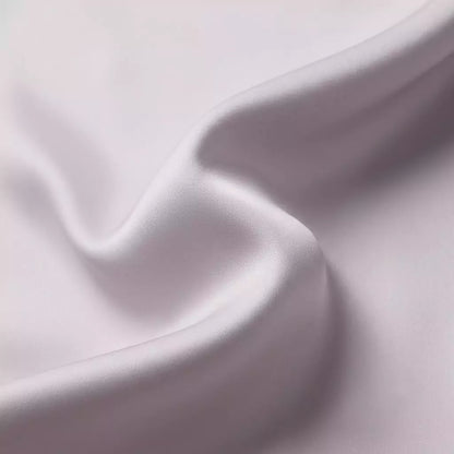 Macro close-up of silky smooth 100% TENCEL™ Lyocell fabric texture Lavender Fog